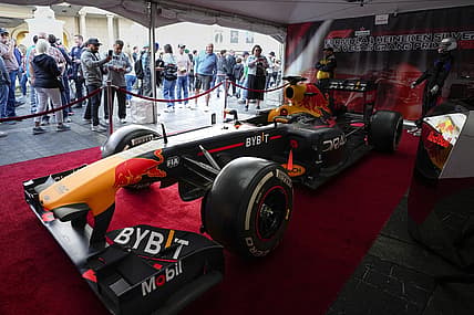 Nov 5, 2022; Las Vegas, Nevada, USA; Race fans view a car during the Formula One Las Vegas Grand Prix Launch Party at Las Vegas Strip. Mandatory Credit: Ray Acevedo-USA TODAY Sports