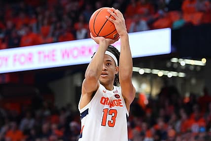 Dec 17, 2022; Syracuse, New York, USA; Syracuse Orange forward Benny Williams (13) shoots the ball against the Cornell Big Red during the first half at the JMA Wireless Dome. Mandatory Credit: Rich Barnes-USA TODAY Sports