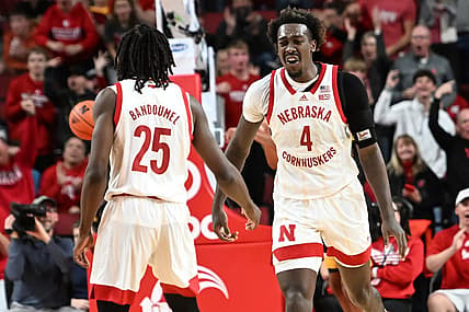 Dec 29, 2022; Lincoln, Nebraska, USA; Nebraska Cornhuskers forward Juwan Gary (4) celebrates a basket with guard Emmanuel Bandoumel (25) in the second half against the Iowa Hawkeyes at Pinnacle Bank Arena. Mandatory Credit: Steven Branscombe-USA TODAY Sports