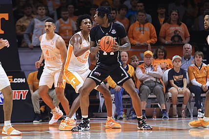 Jan 3, 2023; Knoxville, Tennessee, USA; Mississippi State Bulldogs forward Tyler Stevenson (14) moves the ball against Tennessee Volunteers forward Julian Phillips (2) during the first half at Thompson-Boling Arena. Mandatory Credit: Randy Sartin-USA TODAY Sports
