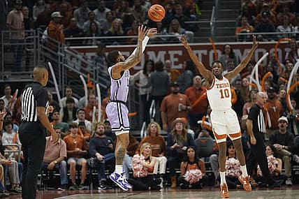 Jan 3, 2023; Austin, Texas, USA; Kansas State Wildcats guard Desi Sills (13) shoots over Texas Longhorns guard Sir'Jabari Rice (10) during the first half at Moody Center. Mandatory Credit: Scott Wachter-USA TODAY Sports