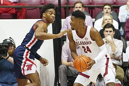 Jan 3, 2023; Tuscaloosa, Alabama, USA; Alabama Crimson Tide forward Brandon Miller (24) drives to the basket against Mississippi Rebels guard Matthew Murrell (11) during the first half at Coleman Coliseum. Mandatory Credit: Marvin Gentry-USA TODAY Sports