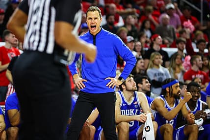 Jan 4, 2023; Raleigh, North Carolina, USA;  Duke Blue Devils coach Jon Scheyer shouts at the referee during the second half against North Carolina State Wolfpack at PNC Arena. Mandatory Credit: Jaylynn Nash-USA TODAY Sports