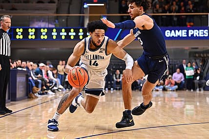 Jan 7, 2023; Villanova, Pennsylvania, USA; Villanova Wildcats guard Caleb Daniels (14) drives against Xavier Musketeers guard Colby Jones (3) in the first half at William B. Finneran Pavilion. Mandatory Credit: Kyle Ross-USA TODAY Sports