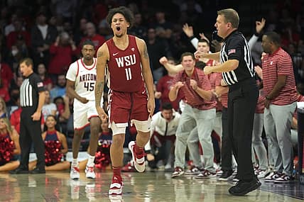 Jan 7, 2023; Tucson, Arizona, USA; The Washington State Cougars bench reacts after a three point basket by Washington State Cougars forward DJ Rodman (11) during the second half against the Arizona Wildcats at McKale Center. Mandatory Credit: Joe Camporeale-USA TODAY Sports
