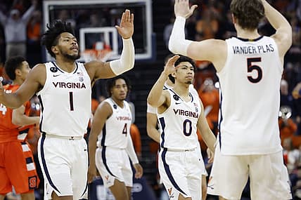 Jan 7, 2023; Charlottesville, Virginia, USA; Virginia Cavaliers forward Jayden Gardner (1) celebrates with Cavaliers guard Kihei Clark (0) and Cavaliers forward Ben Vander Plas (5) against the Syracuse Orange in the second half at John Paul Jones Arena. Mandatory Credit: Geoff Burke-USA TODAY Sports