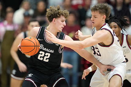 Jan 7, 2023; Santa Clara, California, USA; Santa Clara Broncos guard Brandin Podziemski (22) dribbles the ball against Gonzaga Bulldogs forward Ben Gregg (33) during the first half at Leavey Center. Mandatory Credit: Darren Yamashita-USA TODAY Sports