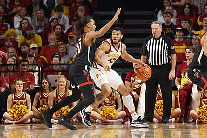 Jan 10, 2023; Ames, Iowa, USA; Texas Tech Red Raiders guard Jaylon Tyson (20) defends Iowa State Cyclones guard Jaren Holmes (13) at James H. Hilton Coliseum. Mandatory Credit: Reese Strickland-USA TODAY Sports