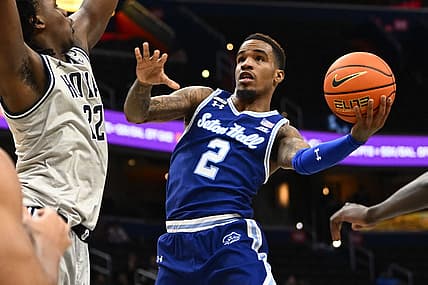 Jan 10, 2023; Washington, District of Columbia, USA; Seton Hall Pirates guard Al-Amir Dawes (2) shoots as Georgetown Hoyas forward Bradley Ezewiro (22) defends during the first half at Capital One Arena. Mandatory Credit: Brad Mills-USA TODAY Sports