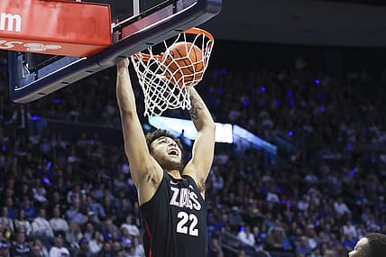 Jan 12, 2023; Provo, Utah, USA; Gonzaga Bulldogs forward Anton Watson (22) dunks the ball against the Brigham Young Cougars in the first half at Marriott Center. Mandatory Credit: Rob Gray-USA TODAY Sports