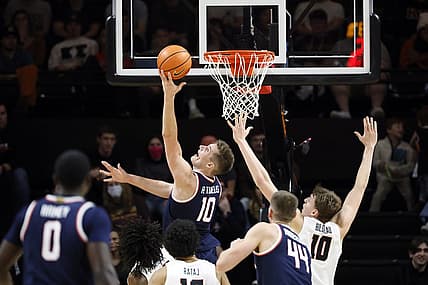 Jan 12, 2023; Corvallis, Oregon, USA; Arizona Wildcats forward Azuolas Tubelis (10) shoots the ball past Oregon State Beavers forward Tyler Bilodeau (10) during the first half at Gill Coliseum. Mandatory Credit: Soobum Im-USA TODAY Sports