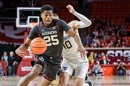 Oklahoma guard Grant Sherfield (25) drives to the hoop in the second half during a college basketball game between the Oklahoma Sooners (OU) and the West Virginia Mountaineers at Lloyd Noble Center in Norman, Okla., Saturday, Jan. 14, 2023.

Ou Vs West Virginia