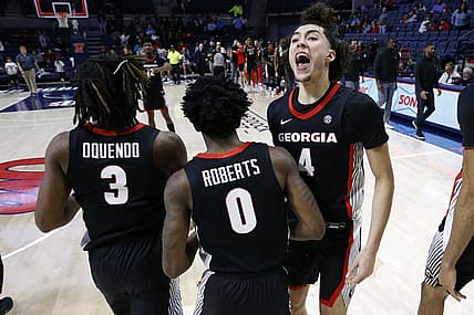 Jan 14, 2023; Oxford, Mississippi, USA; Georgia Bulldogs guard Jusaun Holt (4) reacts with Georgia Bulldogs guard Kario Oquendo (3) and Georgia Bulldogs guard Terry Roberts (0) after defeating the Mississippi Rebels at The Sandy and John Black Pavilion at Ole Miss. Mandatory Credit: Petre Thomas-USA TODAY Sports