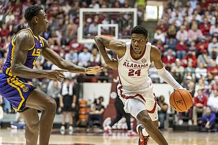 Jan 14, 2023; Tuscaloosa, Alabama, USA; Alabama Crimson Tide forward Brandon Miller (24) drives to the basket against LSU Tigers center Kendal Coleman (4) during the second half at Coleman Coliseum. Mandatory Credit: Marvin Gentry-USA TODAY Sports