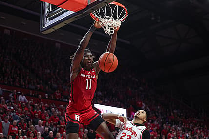 Jan 15, 2023; Piscataway, New Jersey, USA;  Rutgers Scarlet Knights center Clifford Omoruyi (11) dunks over Ohio State Buckeyes forward Zed Key (23) in overtime at Jersey Mike's Arena. Mandatory Credit: Vincent Carchietta-USA TODAY Sports