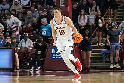 Jan 16, 2023; Charleston, South Carolina, USA; Charleston Cougars forward Ante Brzovic (10) brings the ball up court in the first half against the William & Mary Tribe at TD Arena. Mandatory Credit: David Yeazell-USA TODAY Sports