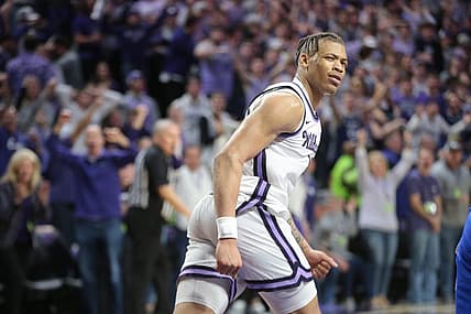 Kansas State senior forward Keyontae Johnson (11) looks back at his team after a dunk in overtime of Tuesday's Sunflower Showdown against Kansas inside Bramlage Coliseum.