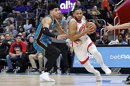 Jan 28, 2023; Detroit, Michigan, USA;  Houston Rockets guard Eric Gordon (10) dribbles on Detroit Pistons guard Killian Hayes (7) in the first half at Little Caesars Arena. Mandatory Credit: Rick Osentoski-USA TODAY Sports
