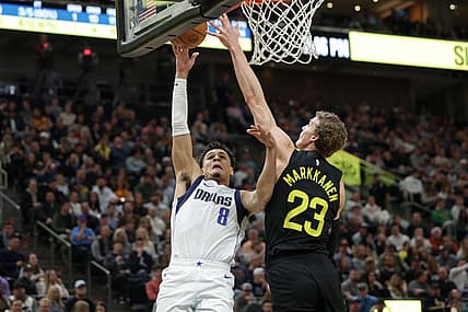 Jan 28, 2023; Salt Lake City, Utah, USA;  Utah Jazz forward Lauri Markkanen (23) blocks the shot of Dallas Mavericks guard Josh Green (8) during the second quarter at Vivint Arena. Mandatory Credit: Chris Nicoll-USA TODAY Sports