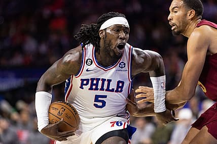 Oct 5, 2022; Philadelphia, Pennsylvania, USA; Philadelphia 76ers guard Julian Champagnie (5) drives against Cleveland Cavaliers forward Isaiah Mobley (15) during the third quarter at Wells Fargo Center. Mandatory Credit: Bill Streicher-USA TODAY Sports