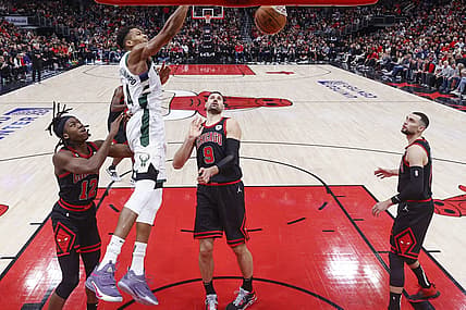Dec 28, 2022; Chicago, Illinois, USA; Giannis Antetokounmpo (34) scores against the Chicago Bulls during the second half at United Center. Mandatory Credit: Kamil Krzaczynski-USA TODAY Sports
