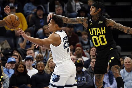 Jan 8, 2023; Memphis, Tennessee, USA; Memphis Grizzlies guard Desmond Bane (22) passes the ball as Utah Jazz guard Jordan Clarkson (00) defends during the second half at FedExForum. Mandatory Credit: Petre Thomas-USA TODAY Sports