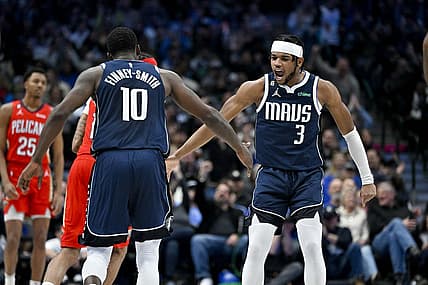 Feb 2, 2023; Dallas, Texas, USA; Dallas Mavericks forward Dorian Finney-Smith (10) and guard Jaden Hardy (3) celebrate during the first half of the game against the New Orleans Pelicans at the American Airlines Center. Mandatory Credit: Jerome Miron-USA TODAY Sports