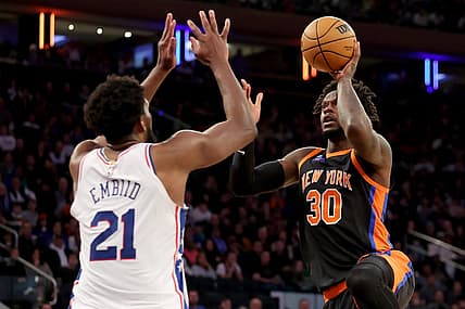 Feb 5, 2023; New York, New York, USA; New York Knicks forward Julius Randle (30) takes a shot against Philadelphia 76ers center Joel Embiid (21) during the fourth quarter at Madison Square Garden. Mandatory Credit: Brad Penner-USA TODAY Sports
