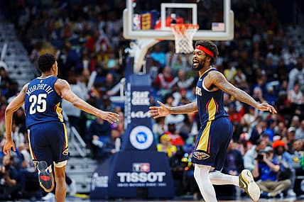 Feb 5, 2023; New Orleans, Louisiana, USA; New Orleans Pelicans forward Naji Marshall (8) and guard Trey Murphy III (25) react to a play against the Sacramento Kings during the third quarter at Smoothie King Center. Mandatory Credit: Andrew Wevers-USA TODAY Sports