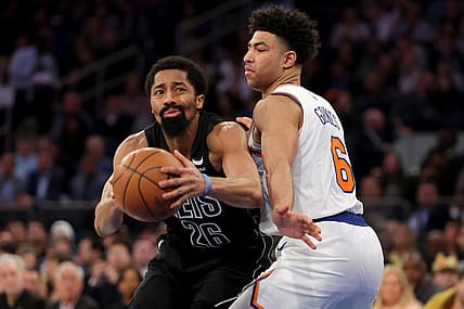Feb 13, 2023; New York, New York, USA; Brooklyn Nets guard Spencer Dinwiddie (26) is fouled as he shoots by New York Knicks guard Quentin Grimes (6) during the second quarter at Madison Square Garden. Mandatory Credit: Brad Penner-USA TODAY Sports
