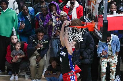 Feb 18, 2023; Salt Lake City, UT, USA; Philadelphia 76ers guard Mac McClung (9) dunks in the Dunk Contest during the 2023 All Star Saturday Night at Vivint Arena. Mandatory Credit: Kirby Lee-USA TODAY Sports