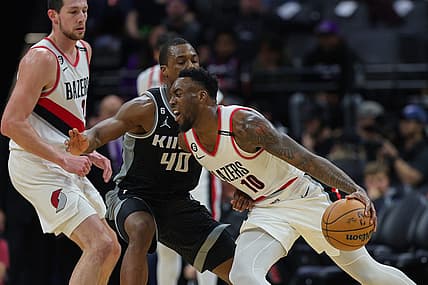 Feb 23, 2023; Sacramento, California, USA; Portland Trail Blazers forward Nassir Little (10) dribbles the ball against Sacramento Kings forward Harrison Barnes (40) during the third quarter at Golden 1 Center. Mandatory Credit: Sergio Estrada-USA TODAY Sports