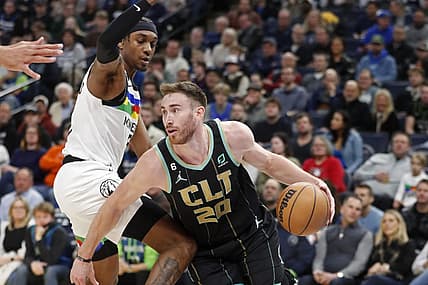 Feb 24, 2023; Minneapolis, Minnesota, USA; Charlotte Hornets forward Gordon Hayward (20) works around Minnesota Timberwolves forward Jaden McDaniels (3) in the first quarter at Target Center. Mandatory Credit: Bruce Kluckhohn-USA TODAY Sports