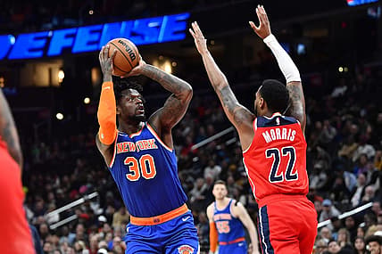 Feb 24, 2023; Washington, District of Columbia, USA; New York Knicks forward Julius Randle (30) shoots over Washington Wizards guard Monte Morris (22) during the first half at Capital One Arena. Mandatory Credit: Brad Mills-USA TODAY Sports