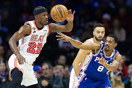 Feb 27, 2023; Philadelphia, Pennsylvania, USA; Philadelphia 76ers guard De'Anthony Melton (8) passes the ball past Miami Heat forward Jimmy Butler (22) during the first quarter at Wells Fargo Center. Mandatory Credit: Bill Streicher-USA TODAY Sports