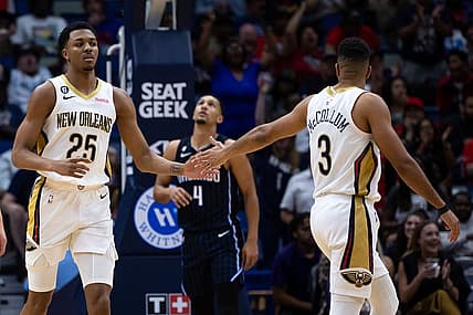 Feb 27, 2023; New Orleans, Louisiana, USA;  New Orleans Pelicans guard Trey Murphy III (25) reacts to making a three point basket with guard CJ McCollum (3) against the Orlando Magic during the first half at Smoothie King Center. Mandatory Credit: Stephen Lew-USA TODAY Sports