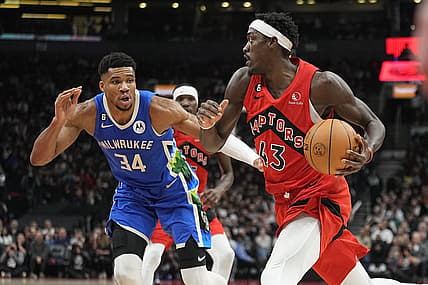 Jan 4, 2023; Toronto, Ontario, CAN; Toronto Raptors forward Pascal Siakam (43) drives to the net against Milwaukee Bucks forward Giannis Antetokounmpo (34) during the first half at Scotiabank Arena. Mandatory Credit: John E. Sokolowski-USA TODAY Sports