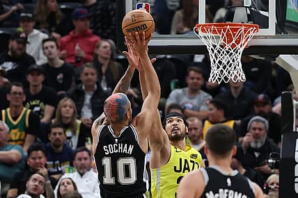 Feb 28, 2023; Salt Lake City, Utah, USA; San Antonio Spurs forward Jeremy Sochan (10) shoots over Utah Jazz guard Johnny Juzang (33) in the second half at Vivint Arena. Mandatory Credit: Rob Gray-USA TODAY Sports