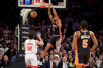 Mar 1, 2023; New York, New York, USA; New York Knicks forward Obi Toppin (1) dunks against Brooklyn Nets forward Joe Harris (12) during the second quarter at Madison Square Garden. Mandatory Credit: Brad Penner-USA TODAY Sports