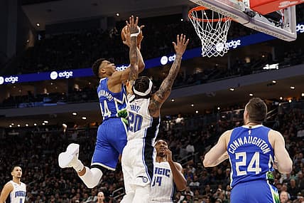 Mar 1, 2023; Milwaukee, Wisconsin, USA;  Milwaukee Bucks forward Giannis Antetokounmpo (34) shoots against Orlando Magic guard Markelle Fultz (20) during the second quarter at Fiserv Forum. Mandatory Credit: Jeff Hanisch-USA TODAY Sports