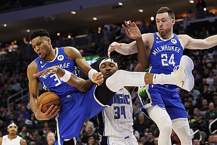 Mar 1, 2023; Milwaukee, Wisconsin, USA;  Milwaukee Bucks forward Giannis Antetokounmpo (34) grabs a rebound during the third quarter against the Orlando Magic at Fiserv Forum. Mandatory Credit: Jeff Hanisch-USA TODAY Sports