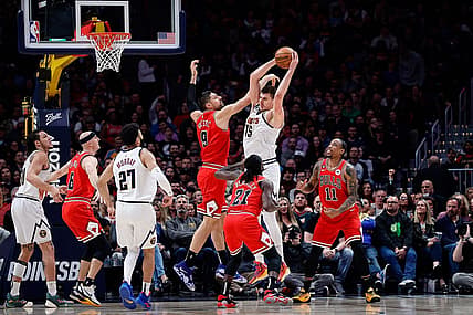 Mar 8, 2023; Denver, Colorado, USA; Denver Nuggets center Nikola Jokic (15) grabs a rebound against Chicago Bulls center Nikola Vucevic (9) as guard Patrick Beverley (21) and forward DeMar DeRozan (11) and guard Jamal Murray (27) and guard Alex Caruso (6) defend in the second quarter at Ball Arena. Mandatory Credit: Isaiah J. Downing-USA TODAY Sports