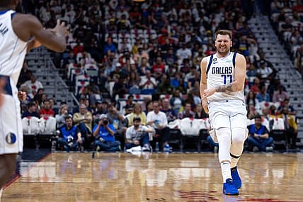 Mar 8, 2023; New Orleans, Louisiana, USA; Dallas Mavericks guard Luka Doncic (77) reacts as he passes the ball to forward Tim Hardaway Jr. (11) against the New Orleans Pelicans during the first half at Smoothie King Center. Mandatory Credit: Stephen Lew-USA TODAY Sports