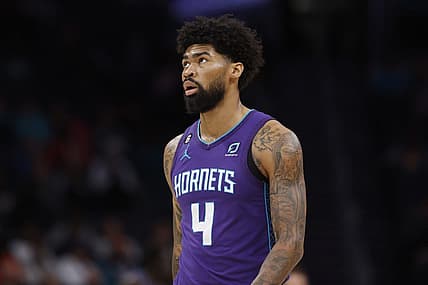 Mar 11, 2023; Charlotte, North Carolina, USA; Charlotte Hornets center Nick Richards (4) looks up at the scoreboard during the first half against the Utah Jazz at Spectrum Center. Mandatory Credit: Brian Westerholt-USA TODAY Sports
