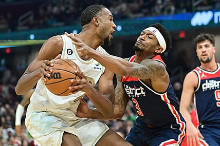 Mar 17, 2023; Cleveland, Ohio, USA; Cleveland Cavaliers forward Evan Mobley (4) drives to the basket against Washington Wizards guard Bradley Beal (3) during the first half at Rocket Mortgage FieldHouse. Mandatory Credit: Ken Blaze-USA TODAY Sports