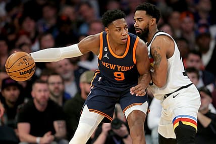 Mar 20, 2023; New York, New York, USA; New York Knicks guard RJ Barrett (9) controls the ball against Minnesota Timberwolves guard Mike Conley (10) during the second quarter at Madison Square Garden. Mandatory Credit: Brad Penner-USA TODAY Sports