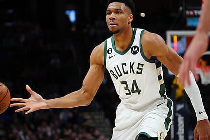 Mar 25, 2023; Denver, Colorado, USA; Milwaukee Bucks forward Giannis Antetokounmpo (34) passes the ball in the second quarter against the Denver Nuggets at Ball Arena. Mandatory Credit: Ron Chenoy-USA TODAY Sports