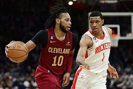 Mar 26, 2023; Cleveland, Ohio, USA; Cleveland Cavaliers guard Darius Garland (10) drives to the basket against Houston Rockets forward Jabari Smith Jr. (1) during the second half at Rocket Mortgage FieldHouse. Mandatory Credit: Ken Blaze-USA TODAY Sports