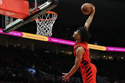 Mar 26, 2023; Portland, Oregon, USA;  Portland Trail Blazers guard Shaedon Sharpe (17) dunks the ball in the second half against the Oklahoma City Thunder at Moda Center. Mandatory Credit: Jaime Valdez-USA TODAY Sports