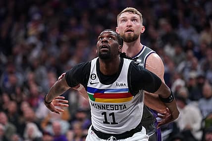 Mar 27, 2023; Sacramento, California, USA; Minnesota Timberwolves center Naz Reid (11) boxes out Sacramento Kings forward Domantas Sabonis (10) in the third quarter at the Golden 1 Center. Mandatory Credit: Cary Edmondson-USA TODAY Sports